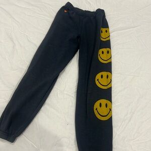Black aviator nation sweatpants with smiley faces down the leg girls size 12